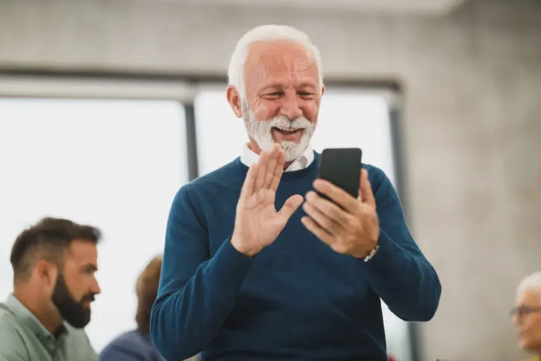 Happy customer checking good news on a phone